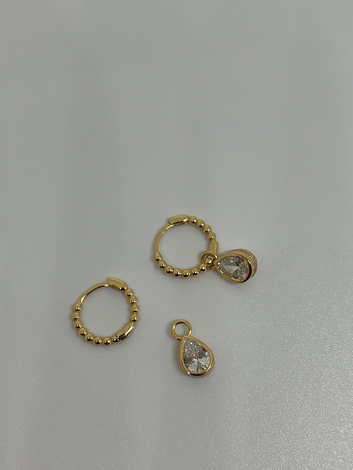 BRINCO ARGOLA ESFERA OVAL 5X6MM PRATA 925 COM BANHO OURO 18K 866229